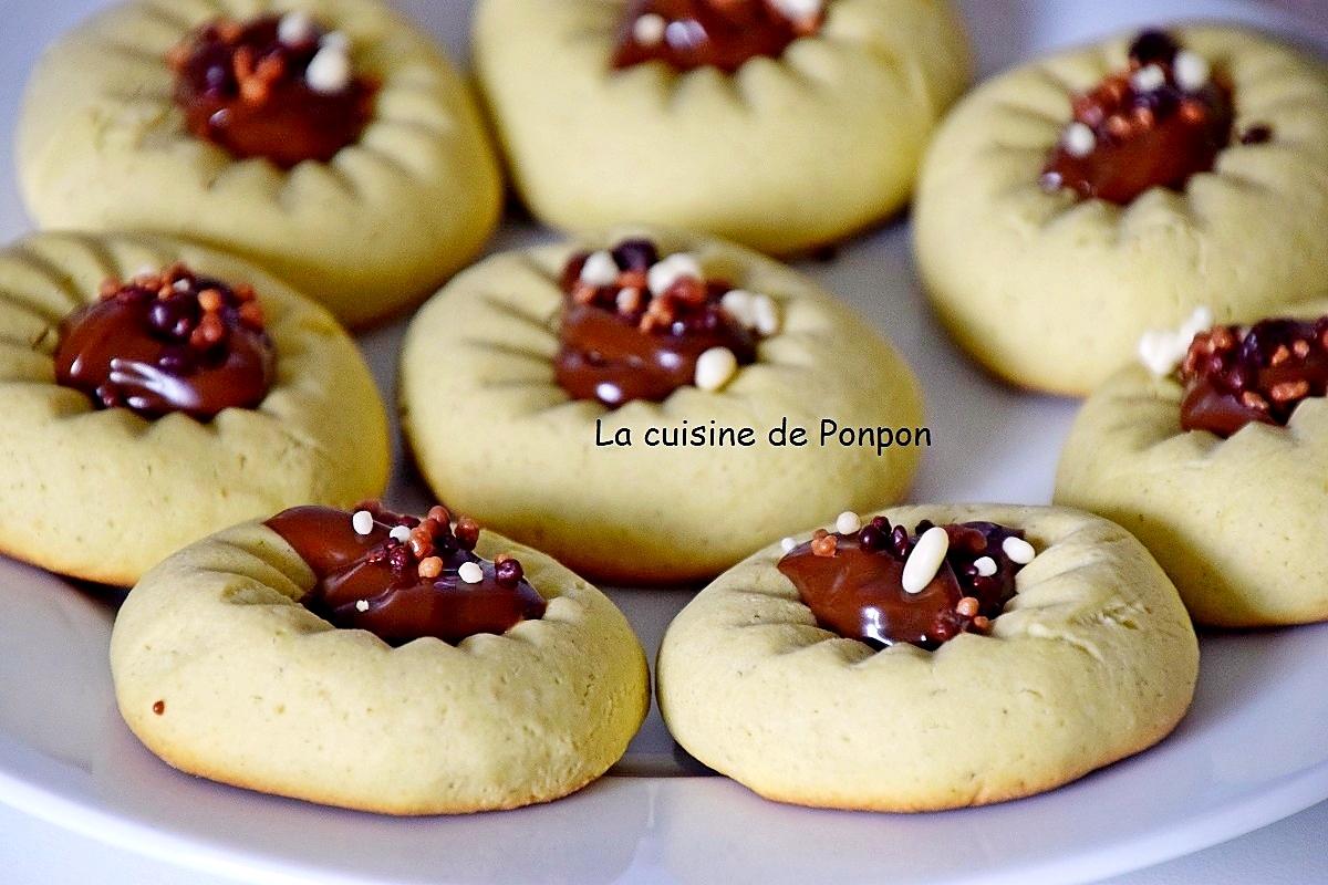 recette Biscuit au presse agrume à la crème de pistache et son coeur à la confiture de lait cacao et noisettes