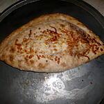 recette Pizza calzone classique ( mozzarella,jambon,oeuf)
