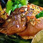 Frais. : recette Tilapia grillé aux fines herbes cuit dans des feuilles de bananes
