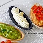 recette Apéritif de fines coquilles garnies de crème d'avocat, crème de tomates et fines herbes