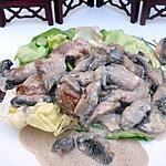 recette ESCALOPE DE PORC FLAMBE AU COGNAC ET SES CHAMPIGNONS