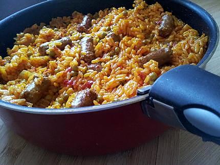 recette Riz poêlé aux merguez et petits pois à l'espagnole