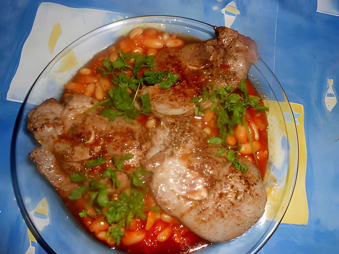 Recette de Tranches de gigot aux haricots à la tomate