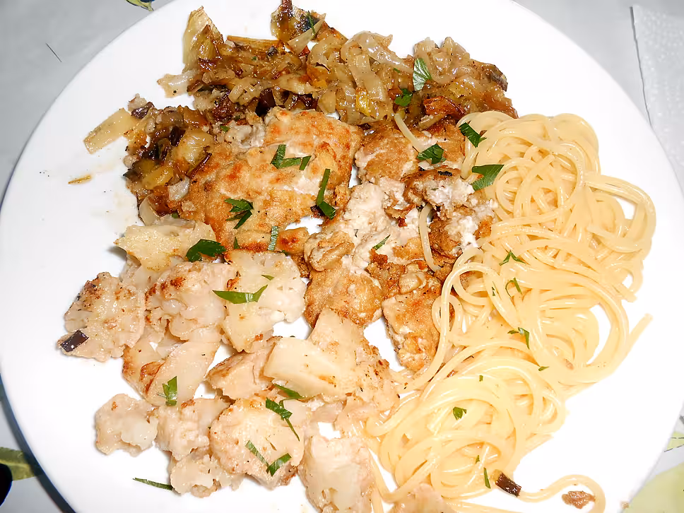 recette CERVELLE DE PORC AUX PETITS OIGNONS