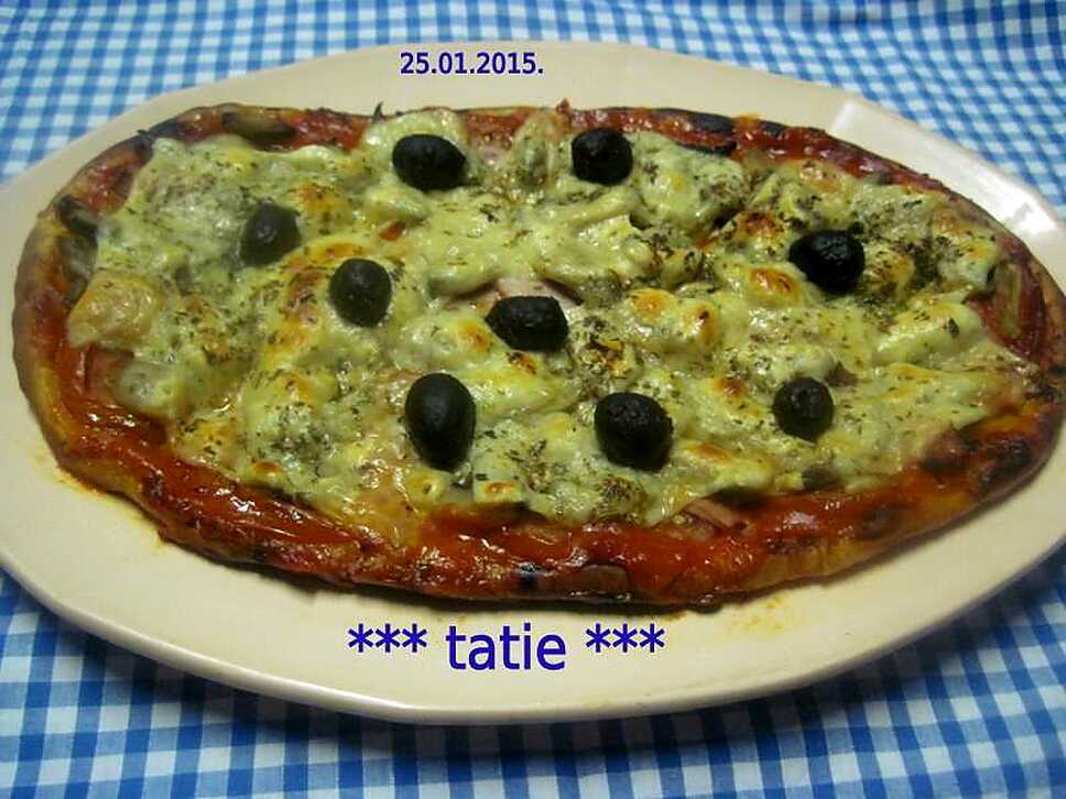 recette Pizza au jambon.champignons. emmental.