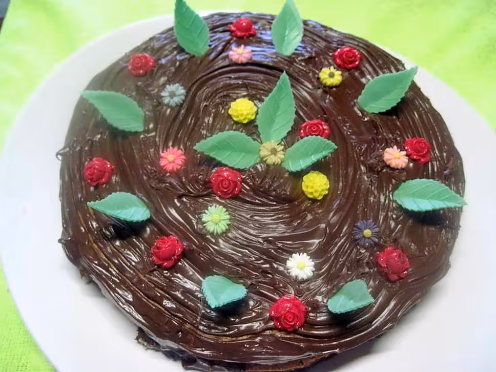 recette Gâteau fourré à l'orange. nappage chocolat.