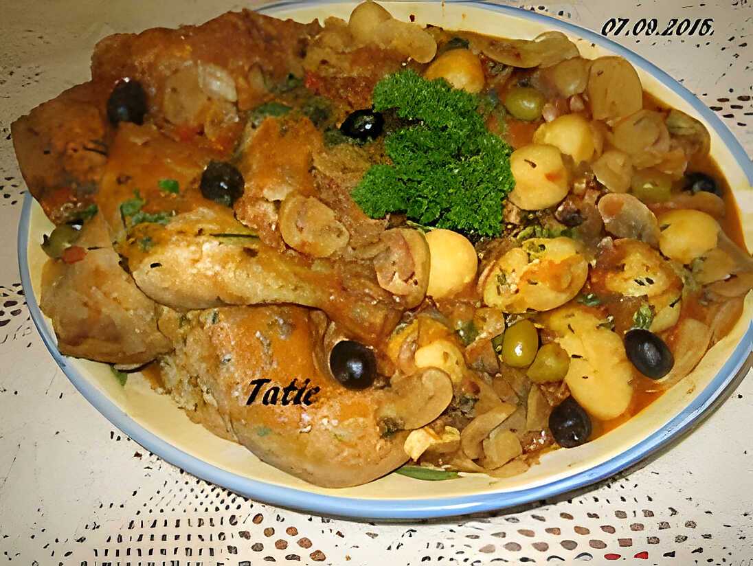 Recette de Cuisses de poulet aux légumes en sauce cuisiné.