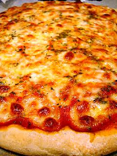 recette Pizza maison crousti-moelleuse à la pâte délicieusement parfumée