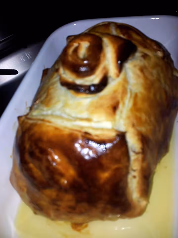 recette Rôti de porc en croute farcies au foie gras et confiture d'oignons