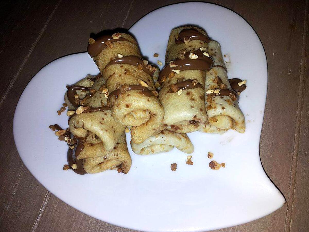 recette Mini crêpes roulé au nutella et pépites de pralin