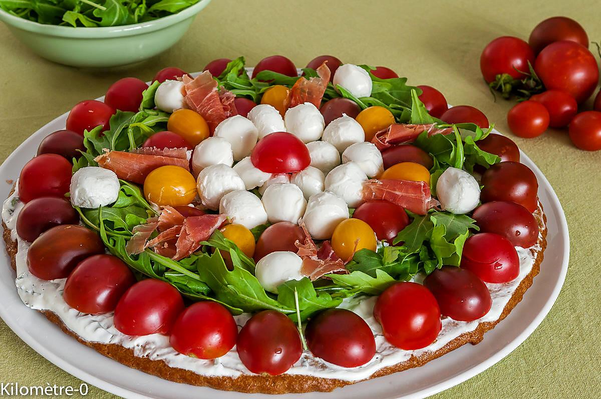 recette Tarte salée aux tomates cerises, mozzarella et roquette