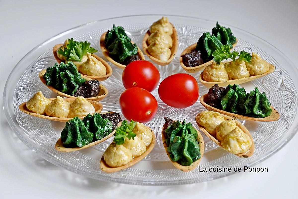 recette Amuse bouche garni de caviar de pois chiches au chèvre, de pesto aux épinards et confit à la truffe d'été