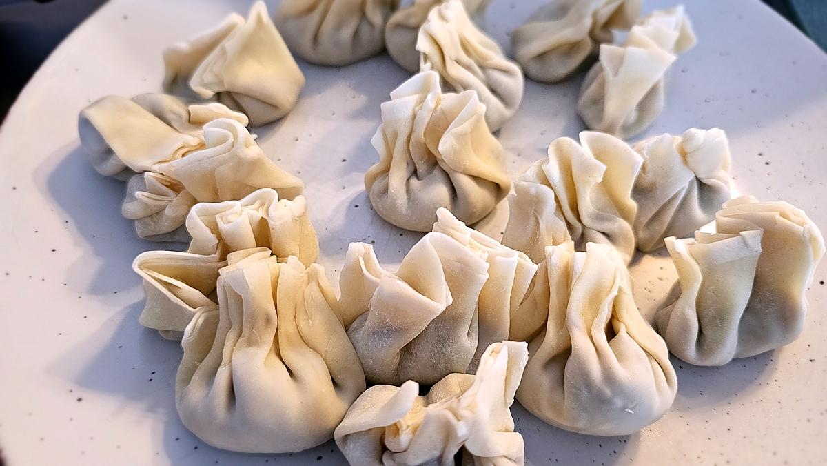 recette Wonton au poulet , champignons noir et ciboule