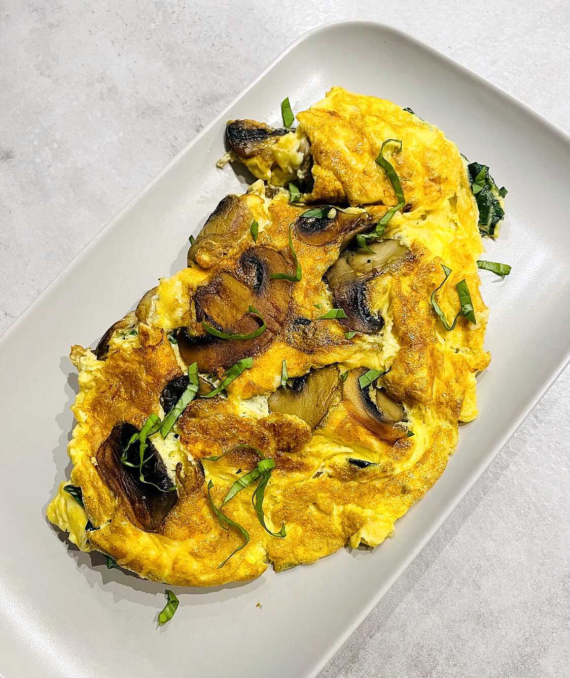 Recette d'Omelette aux champignons et épinards frais Recette d'Omelette aux champignons et épinards frais