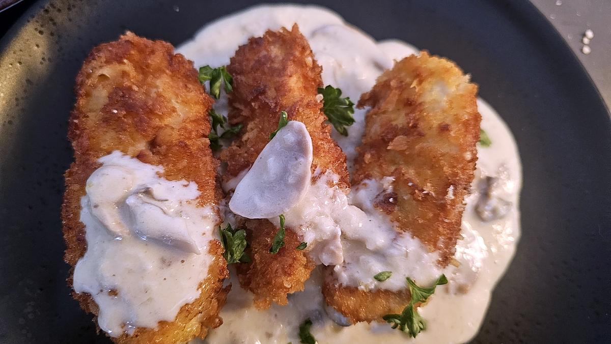 recette Escalope de dinde dorée et croustillante, sauce aux champignons et parmesan