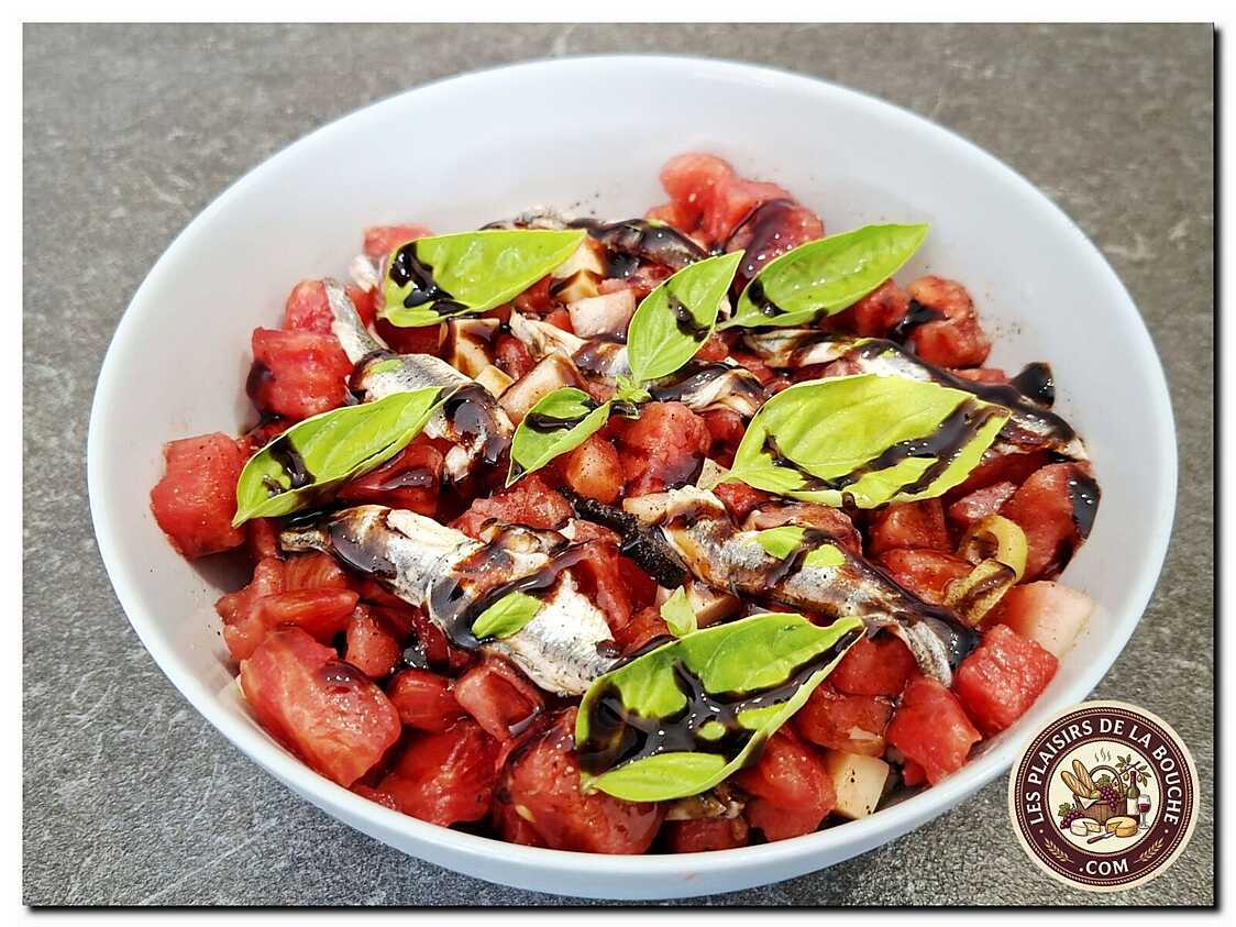 Salade tomate, pastèque, anchois et conté
