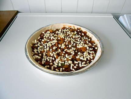 recette Pizza au boeuf haché, poivrons, champignons, mozza et chèvre.