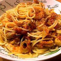 recette Spaghettis aux fruits de mer, à l'ail et aux tomates