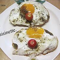 recette Oeufs sur le plat sur tranches de pain au pesto.