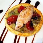 recette Tarte feuilletée à l'anchoiade, fondue de légumes croquants, tomates confites et filet de rouget