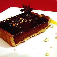 recette Tarte au chocolat épicé et pistache et son coulis de mangue anisé